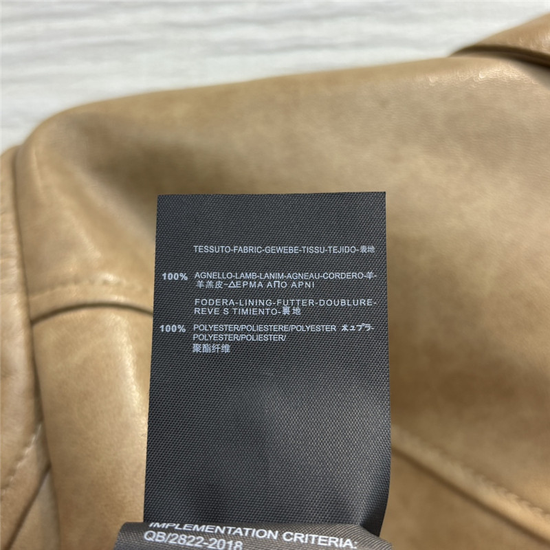 M1um1u flap lapel double pocket short leather jacket