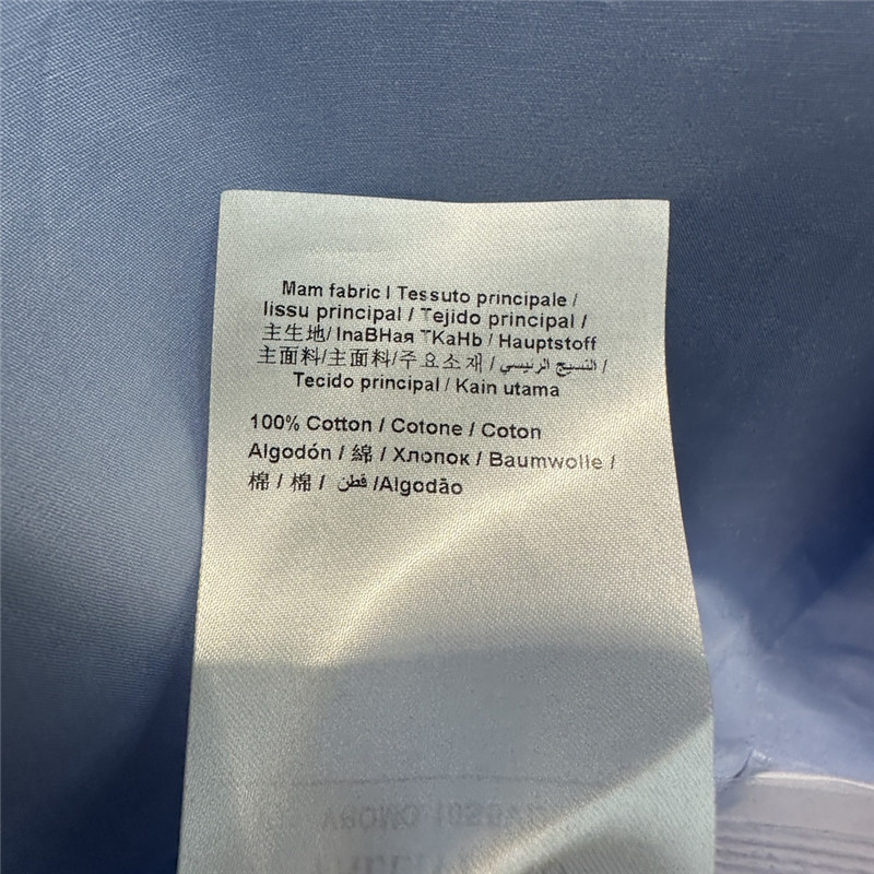 Va1e*ntin0 v-shaped metal button tie embellished shirt