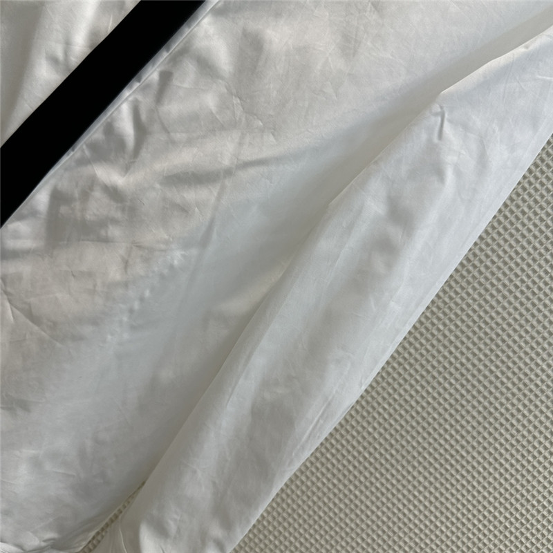 Va1e*ntin0 v-shaped metal button tie embellished shirt