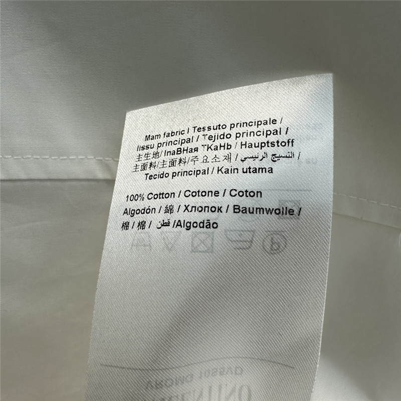 Va1e*ntin0 v-shaped metal button tie embellished shirt