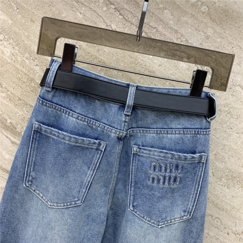 M1um1u distressed letter logo embroidered belt jeans