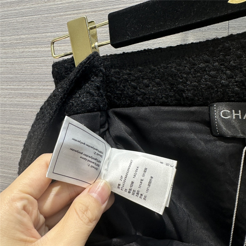 Ch**el tweed pleated mini skirt