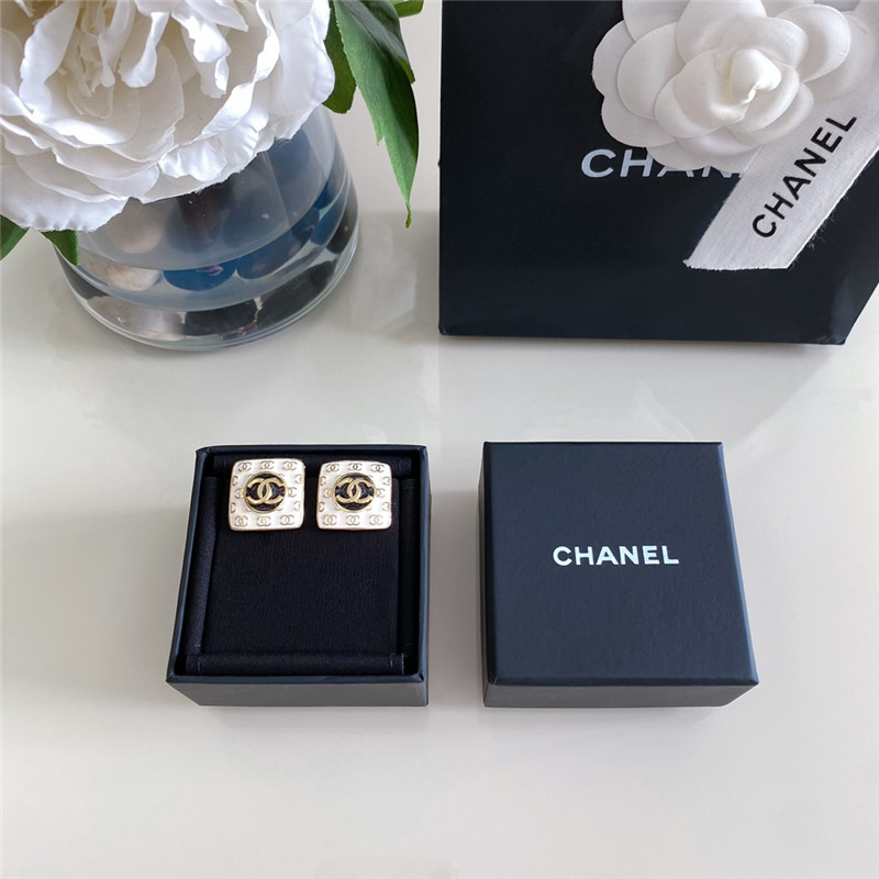 Ch**el white enamel Ch**el stud earrings
