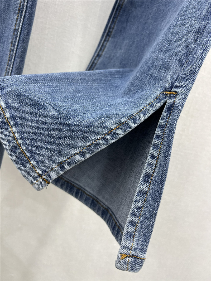 M1um1u waistband letter patch logo embellished jeans