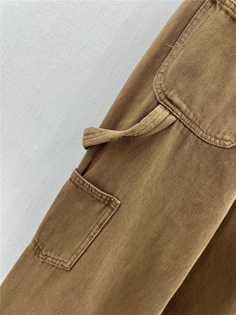 M1um1u waistband letter patch logo embellished jeans