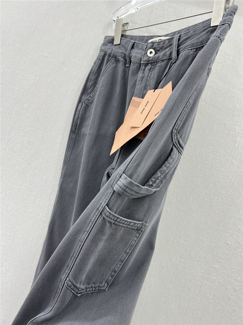 M1um1u waistband letter patch logo embellished jeans