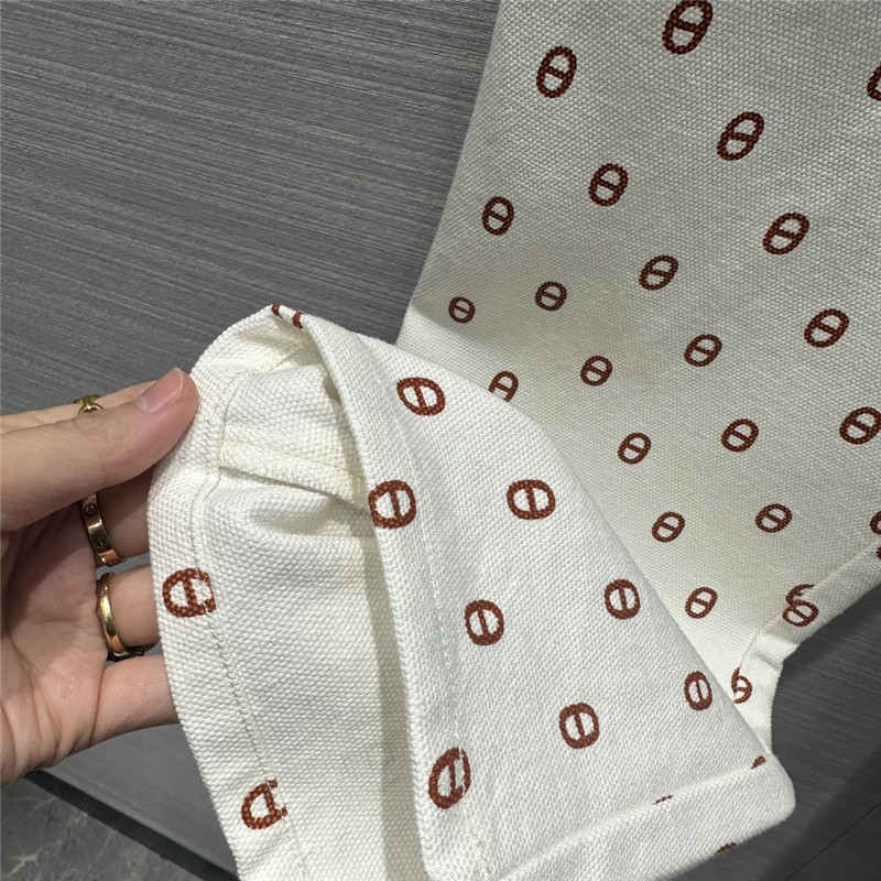 H**me5 new color pig nose logo denim trousers