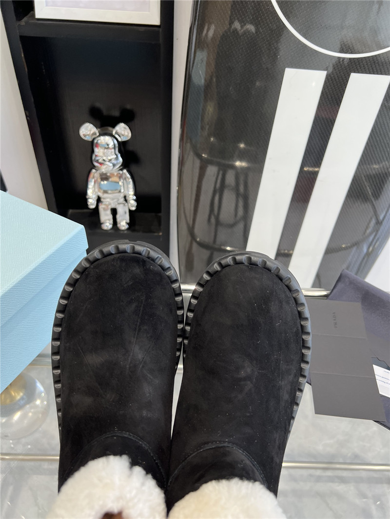 Pra*a triangle-logo suede boots in black