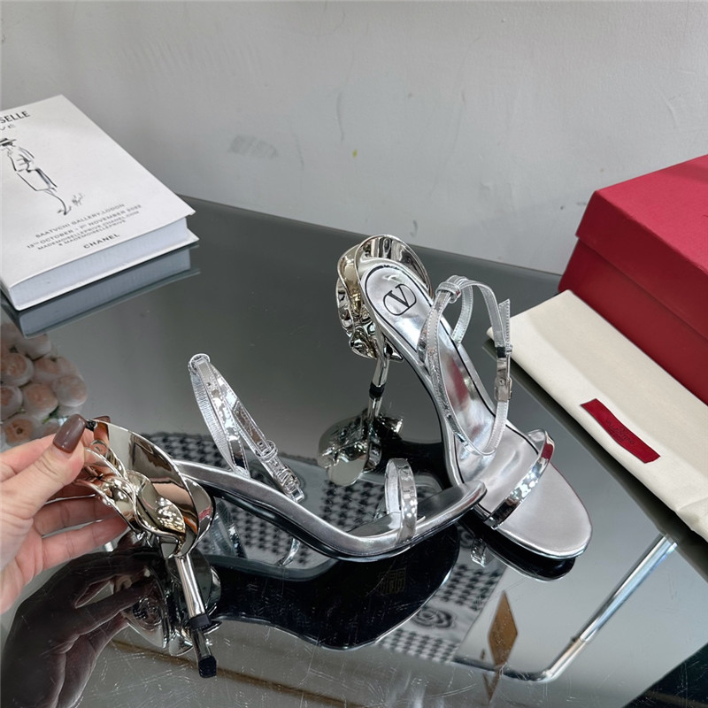 Va1e*ntin0 lacquered flower embellished high heel sandals