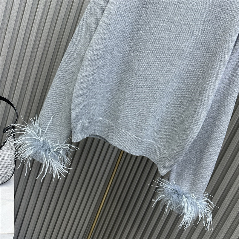 Va1e*ntin0 feather-trimmed wool sweater