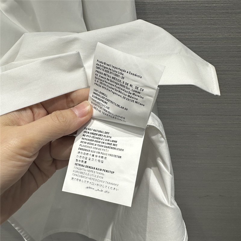 Pra*a white shirt dress with rhinestone buttons