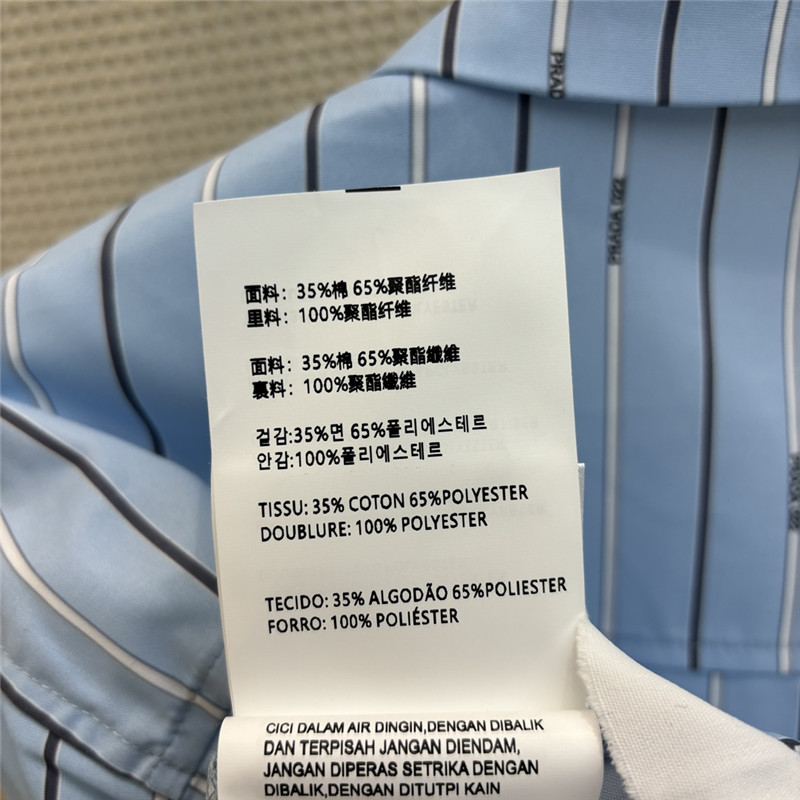 Pra*a triangle logo decorative stripe suit