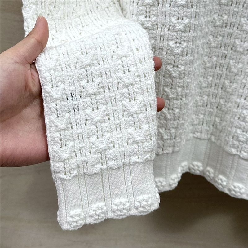 Ch**el hollow embossed braided top