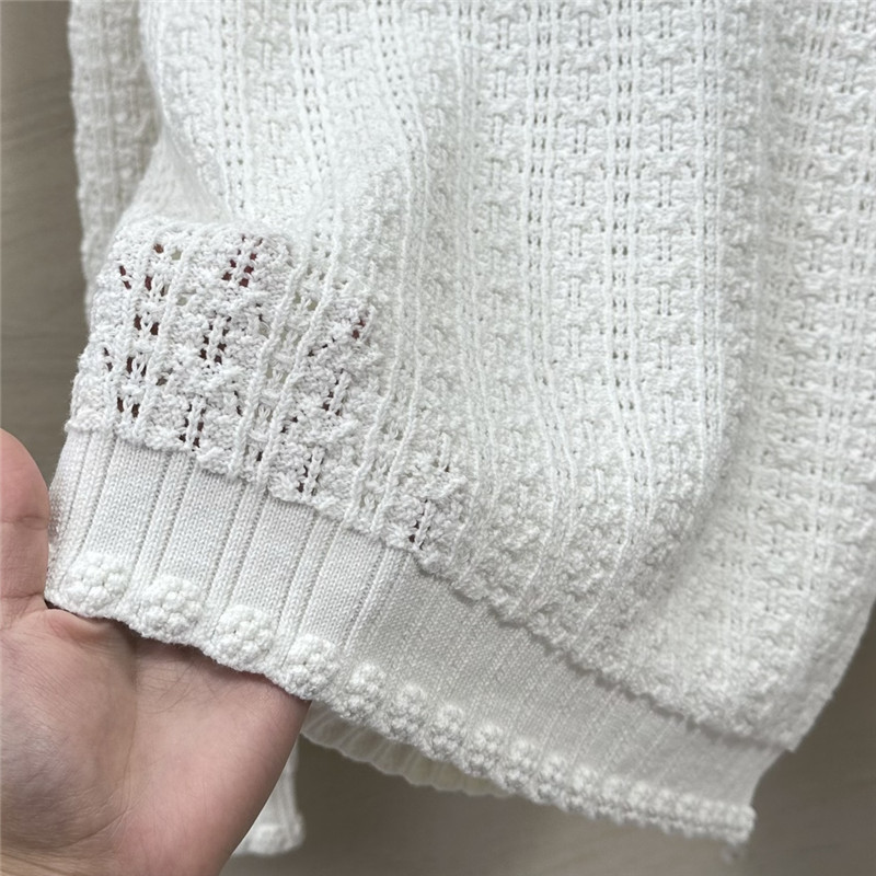 Ch**el hollow embossed braided top