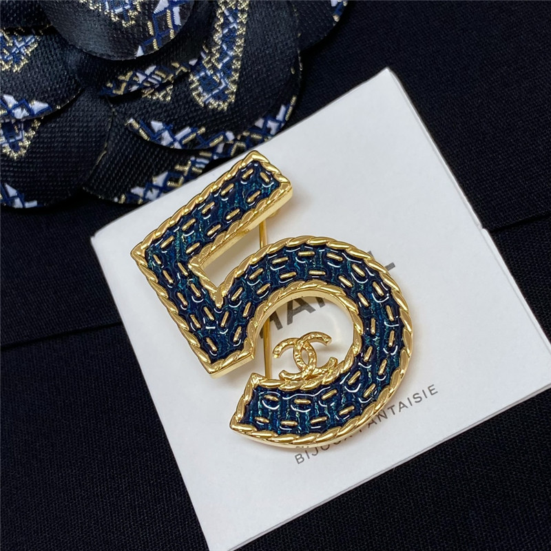 Ch**el denim 5 word double c brooch