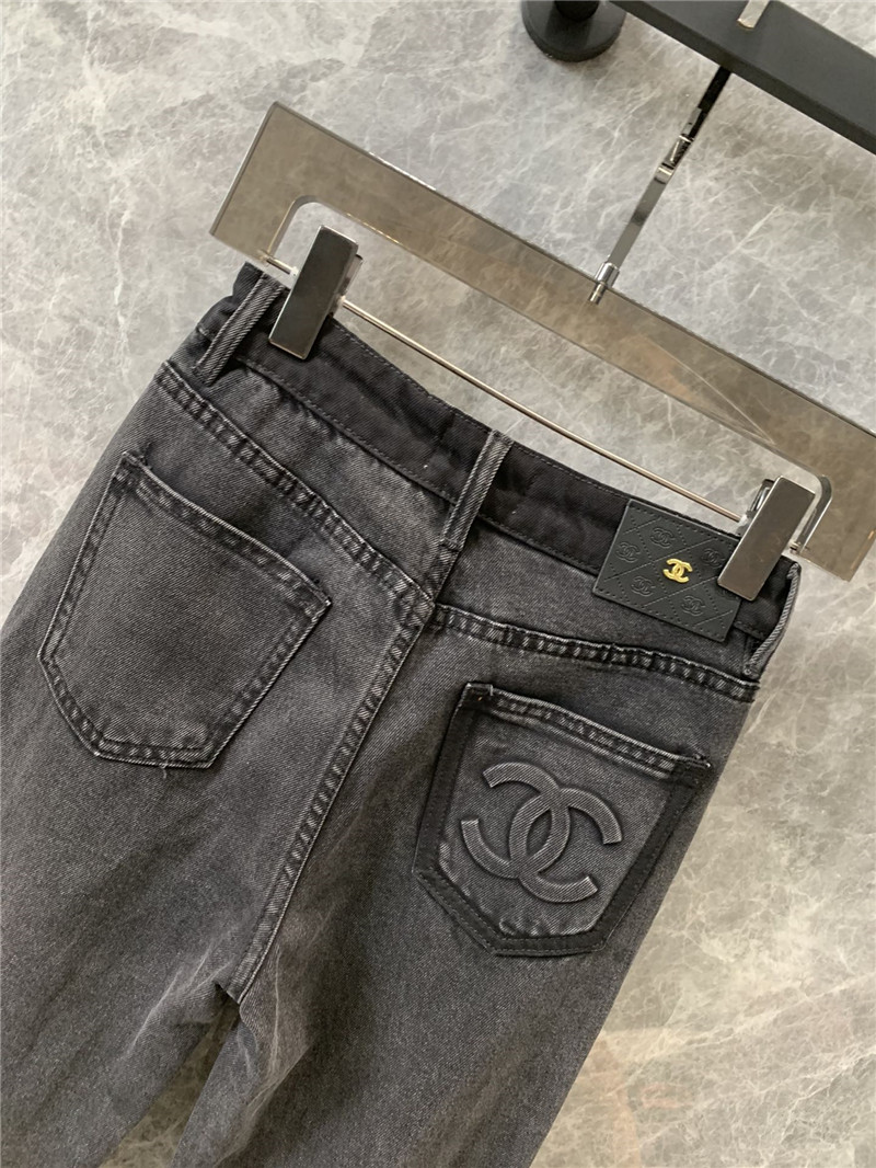 Ch**el waistband shaded back pocket laminated logo jeans