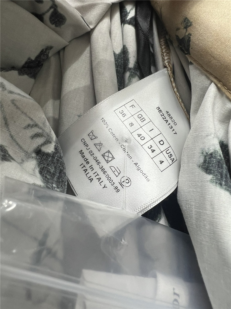 D10r black floral print technical pleated skirt