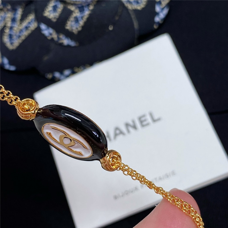 Ch**el black and white button double chain bracelet