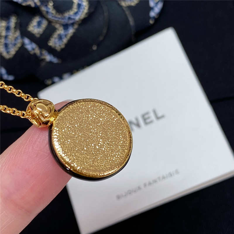 Ch**el black and white button necklace