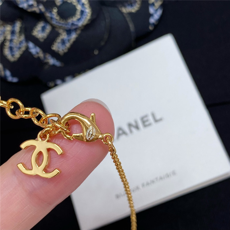 Ch**el black and white button necklace