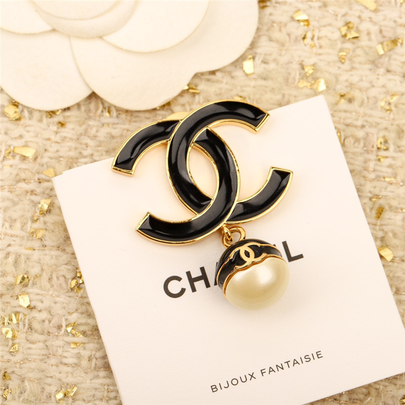 Ch**el black enamel hanging pearl brooch