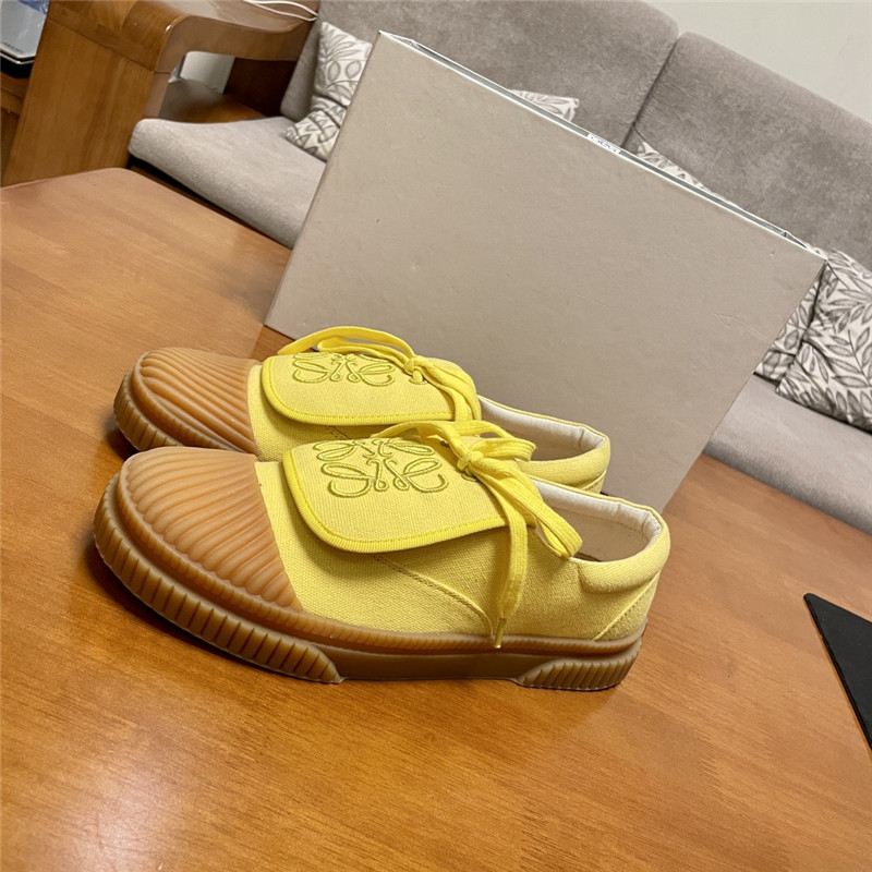 L0ew* women’s yellow sneakers