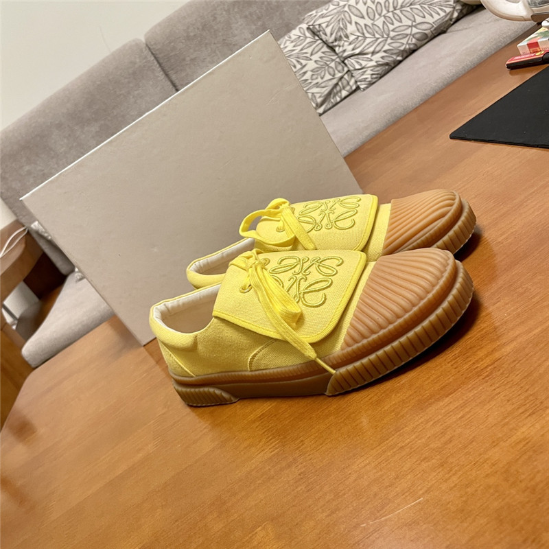 L0ew* women’s yellow sneakers
