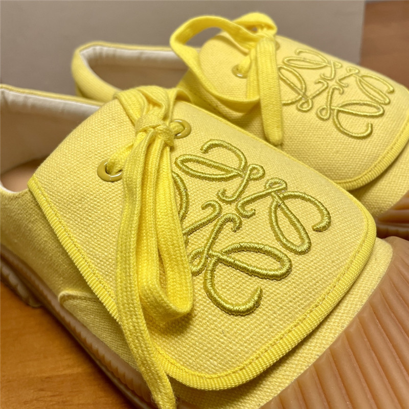 L0ew* women’s yellow sneakers
