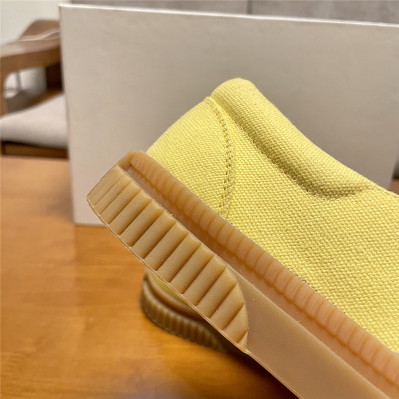 L0ew* women’s yellow sneakers