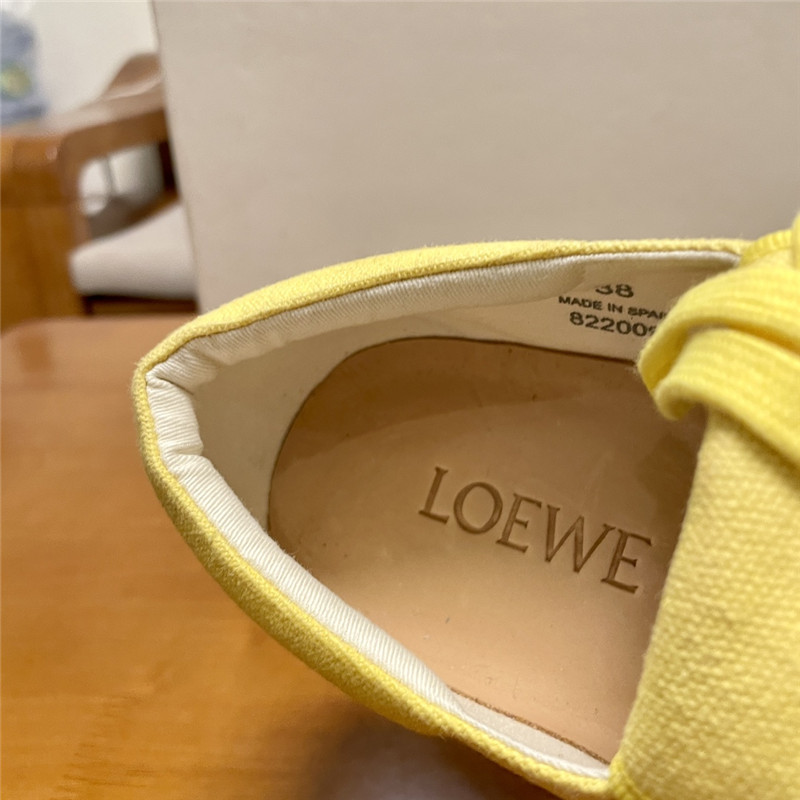 L0ew* women’s yellow sneakers