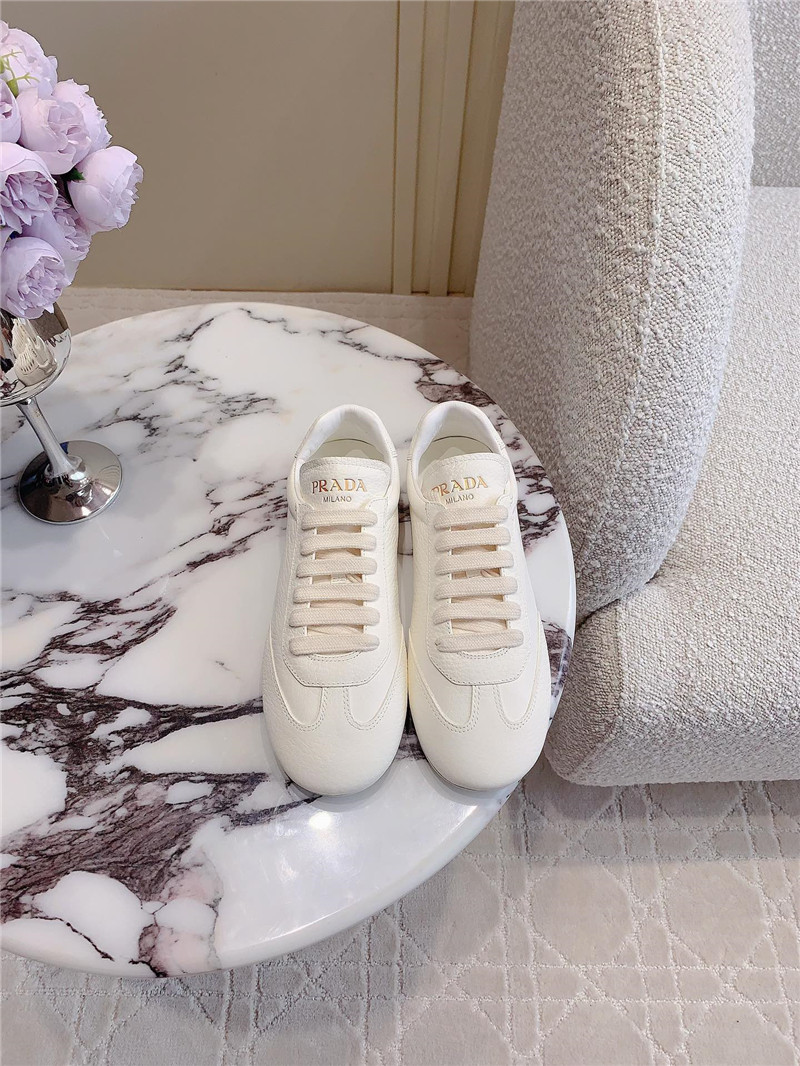 Pra*a triangle logo sneakers