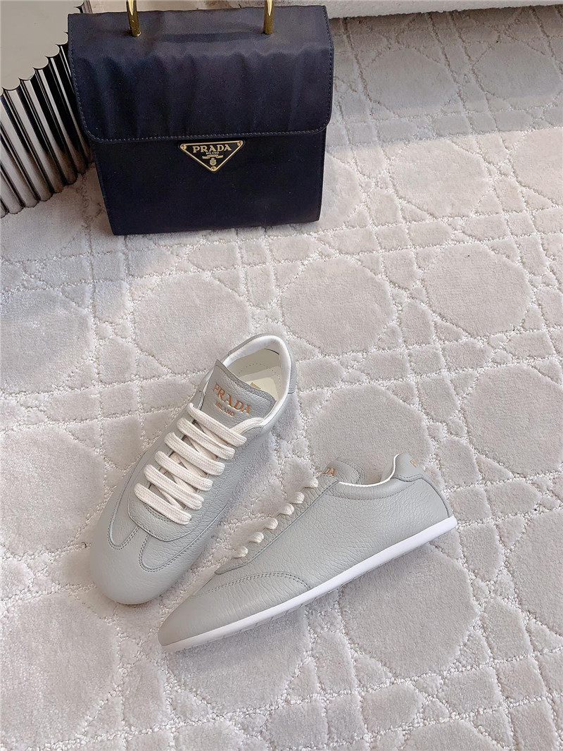 Pra*a triangle logo sneakers in gray