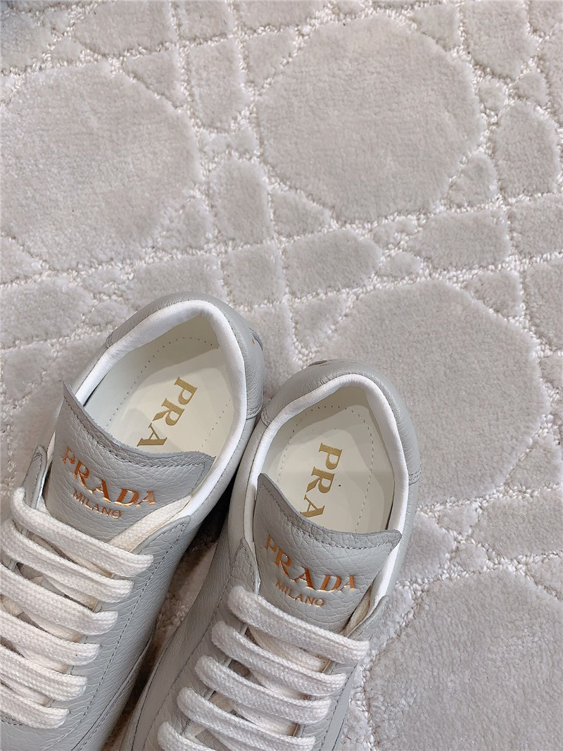 Pra*a triangle logo sneakers in gray