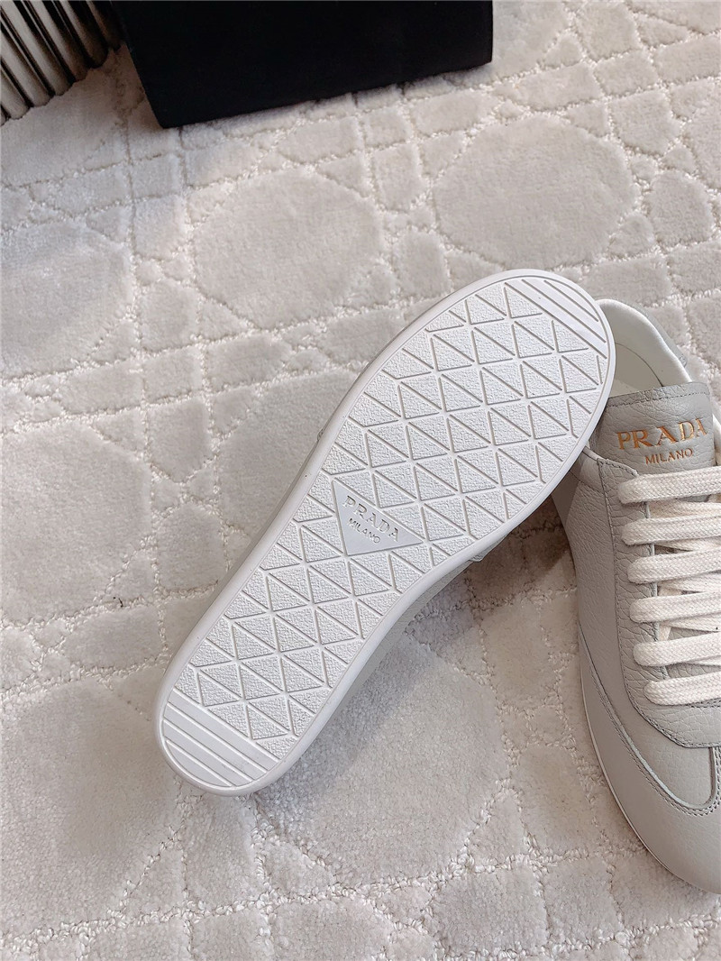 Pra*a triangle logo sneakers in gray