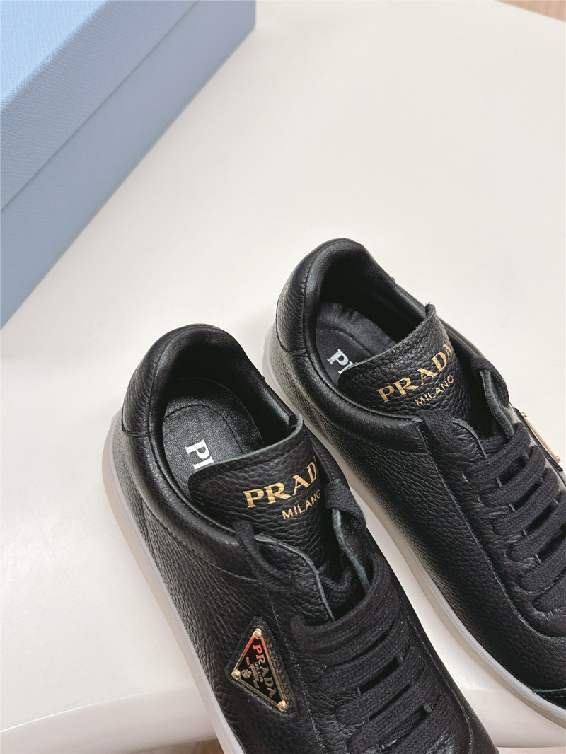 Pra*a black leather sneakers