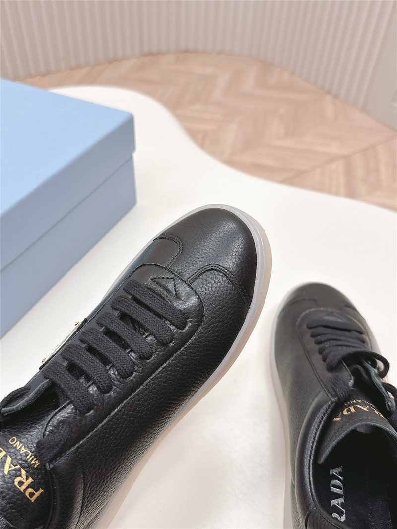 Pra*a black leather sneakers