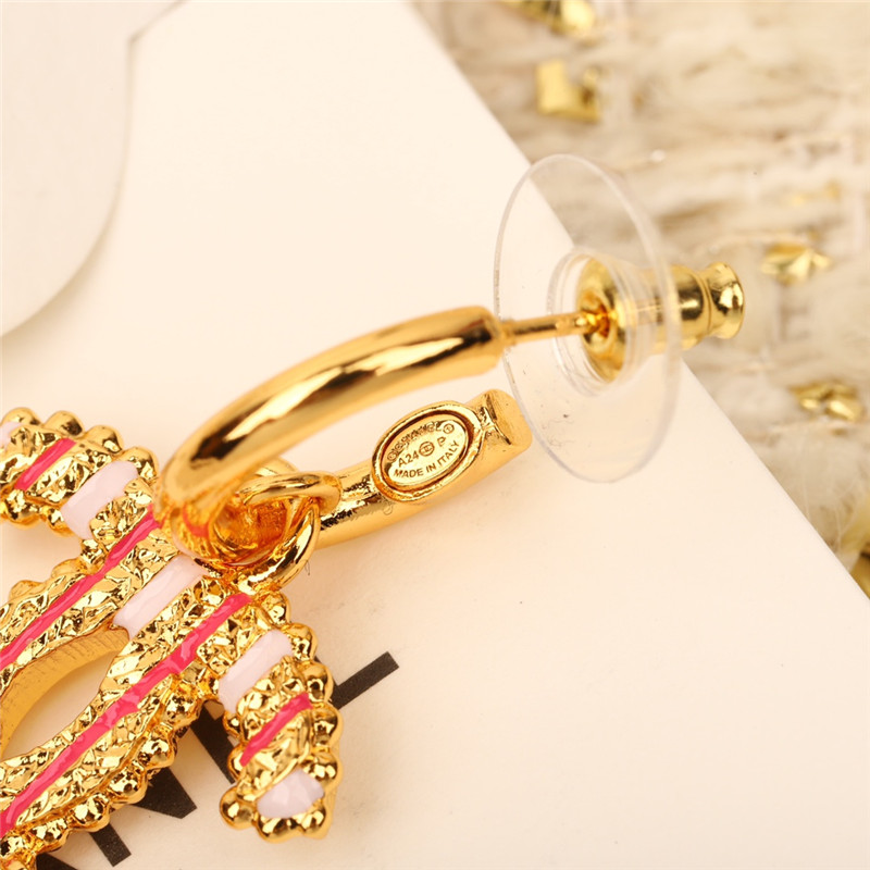 Ch**el vertical stripe enamel double c earrings