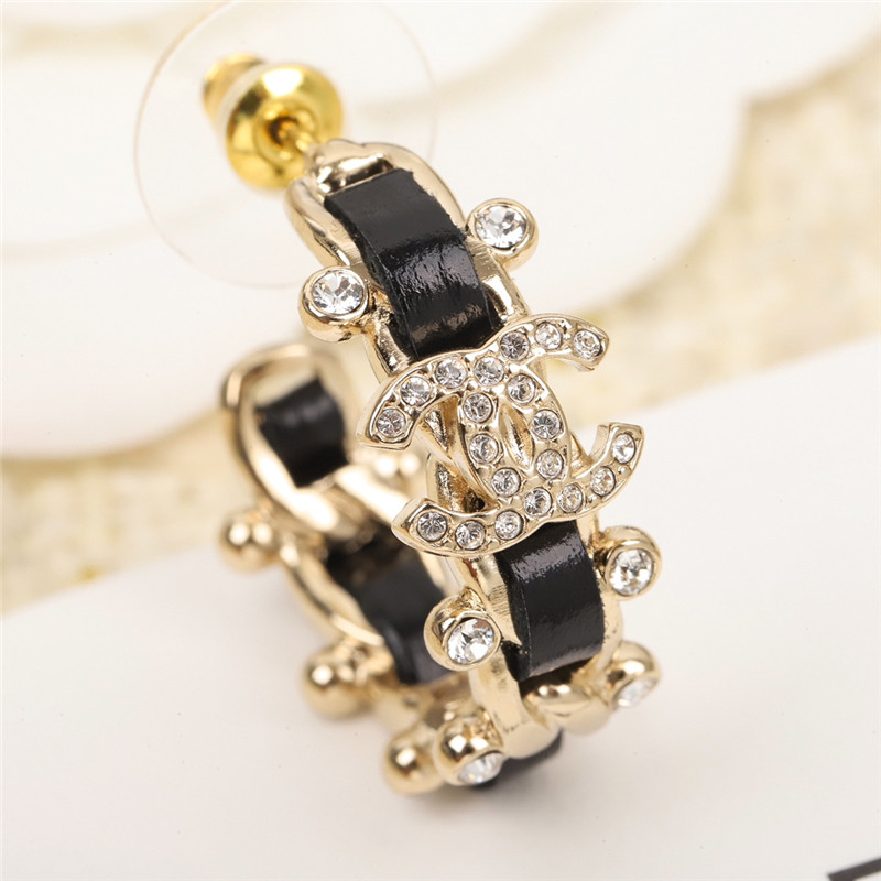 Ch**el handmade leather earrings