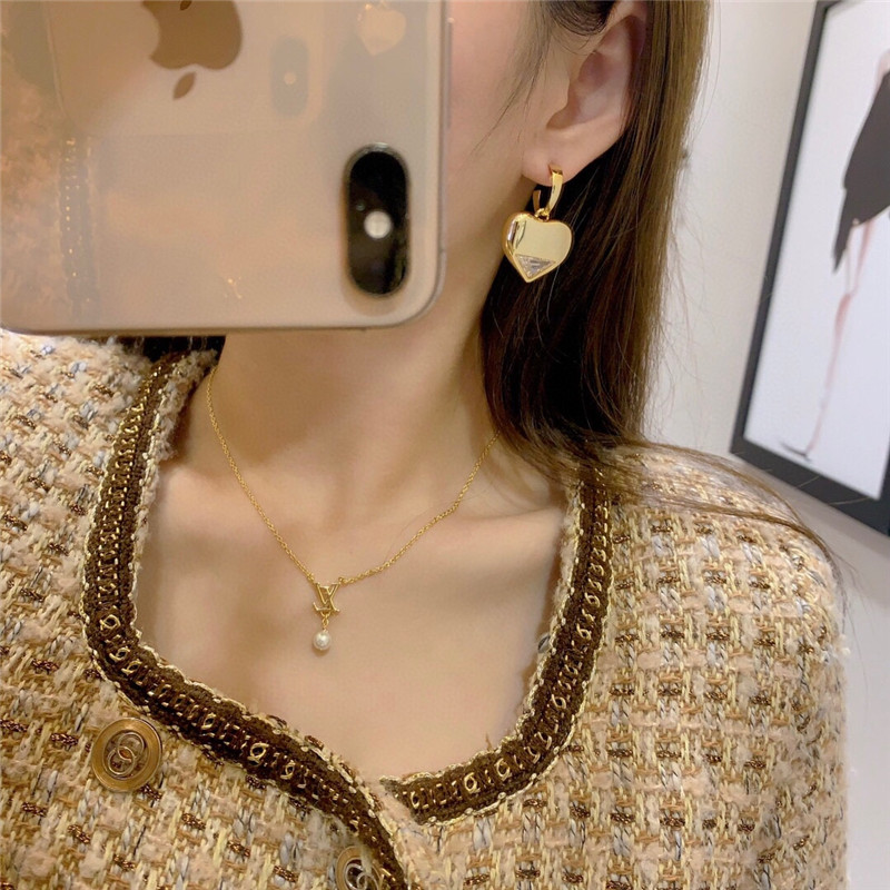 Pra*a new triangle love earrings