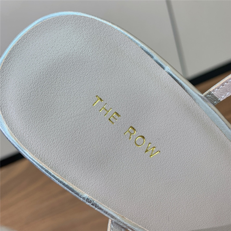 The R0w silver pointed toe slingback pumps