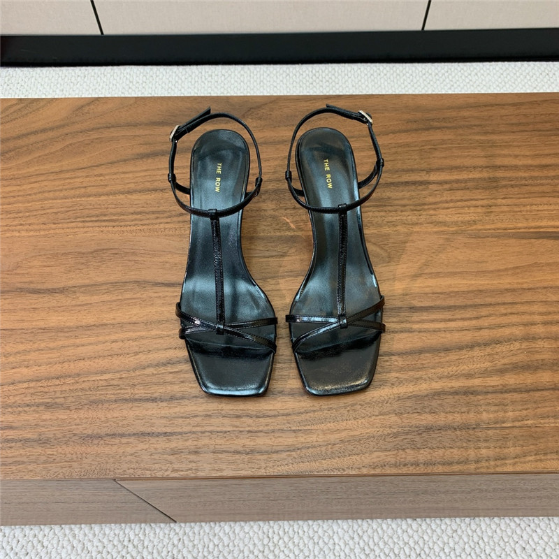 The R0w black patent leather wedge sandals