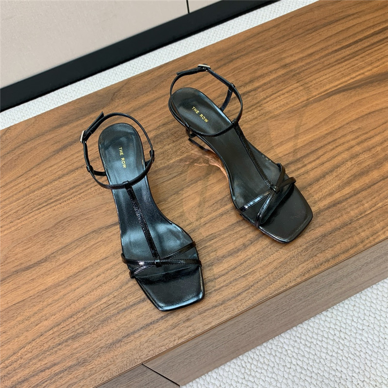 The R0w black patent leather wedge sandals