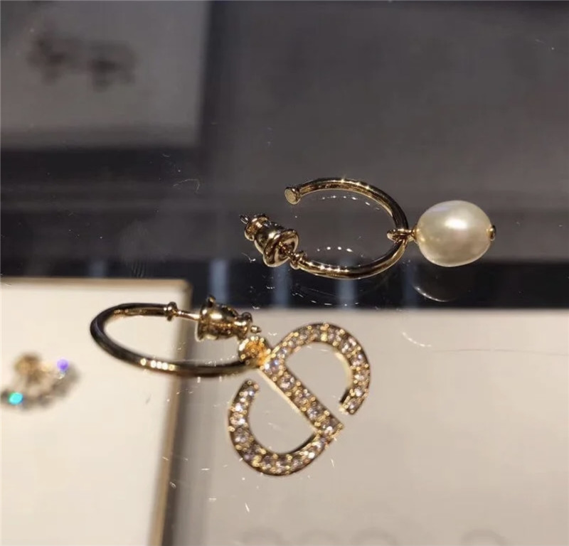 D10r new left and right asymmetrical earrings