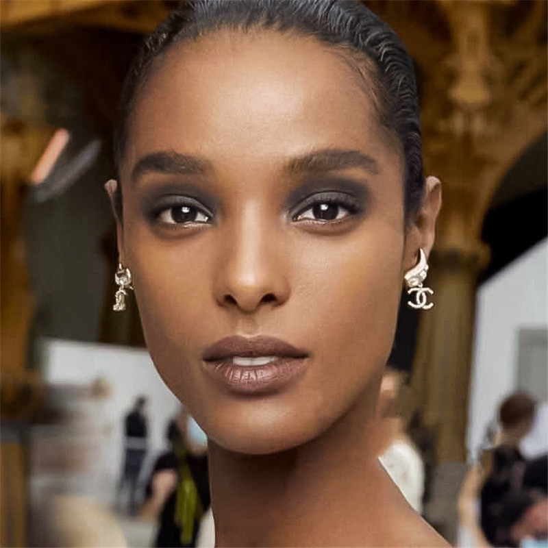 Ch**el angel wings double c earrings