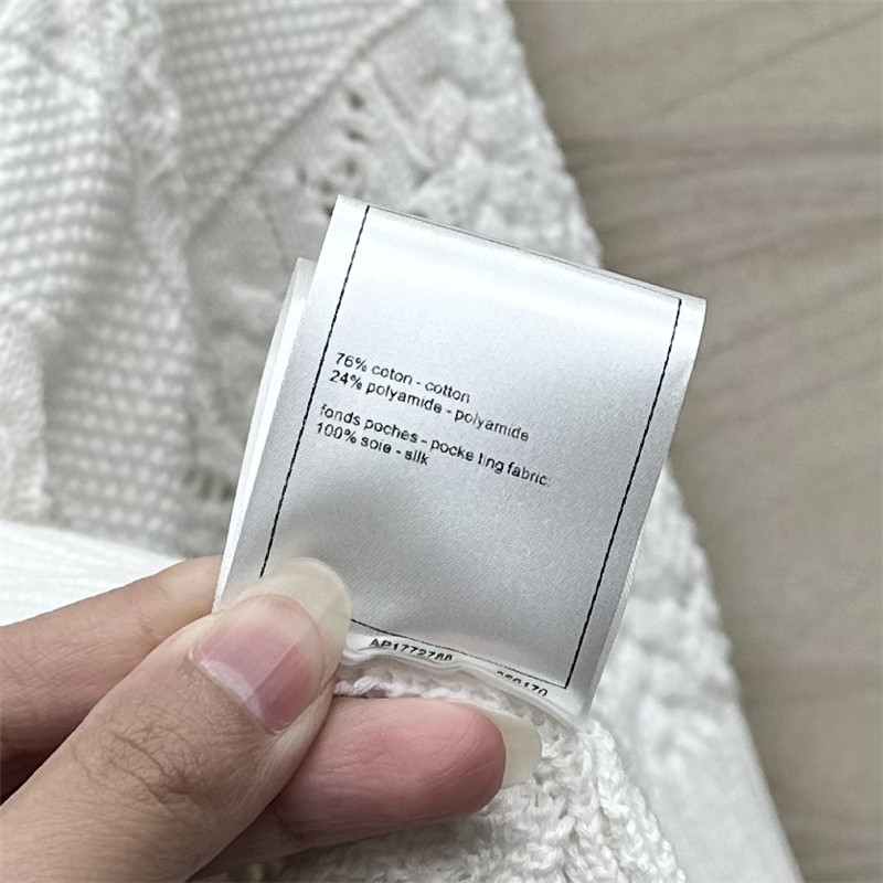 Ch**el logo wool short sleeve sweater in white