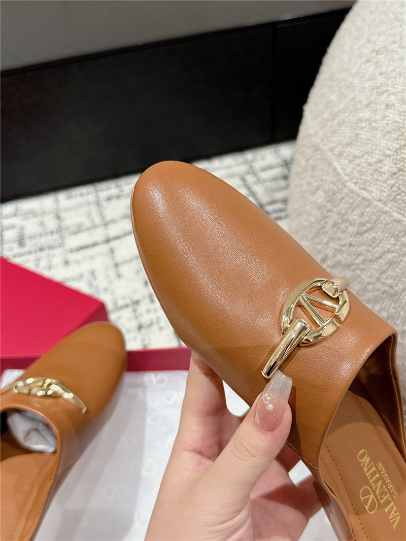 Va1e*ntin0 garavani vlogo signature leather mules in brown