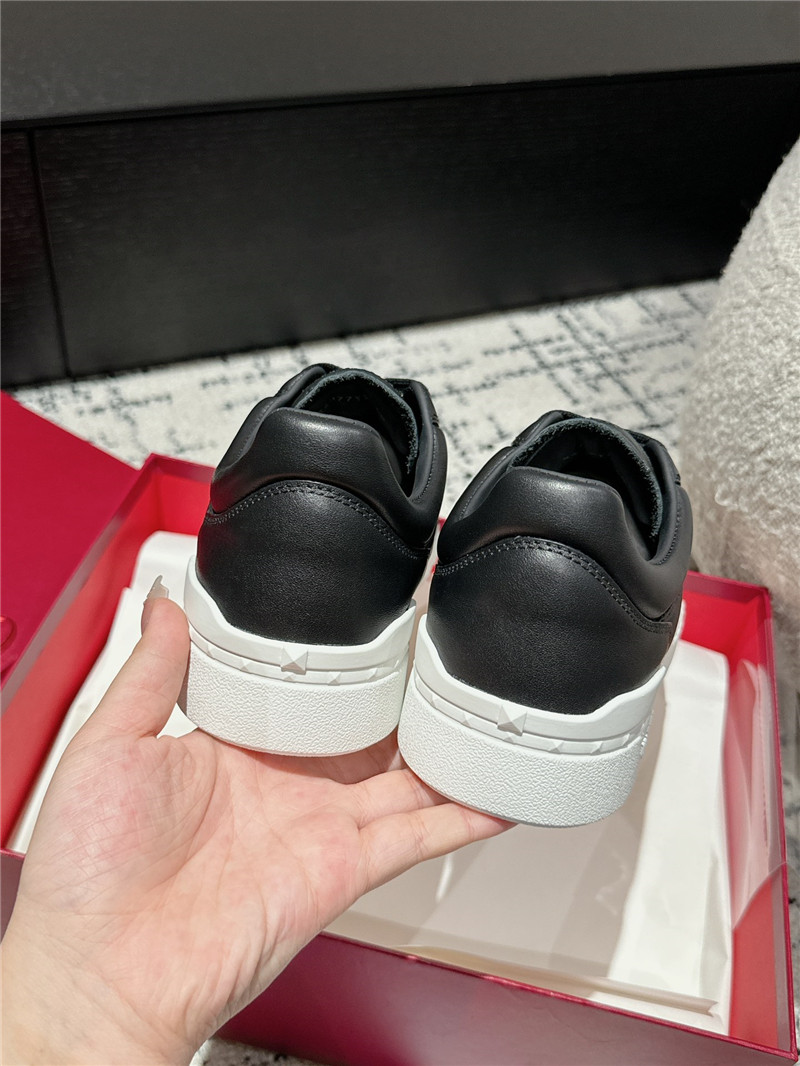 Va1e*ntin0 black leather lace-up sneakers