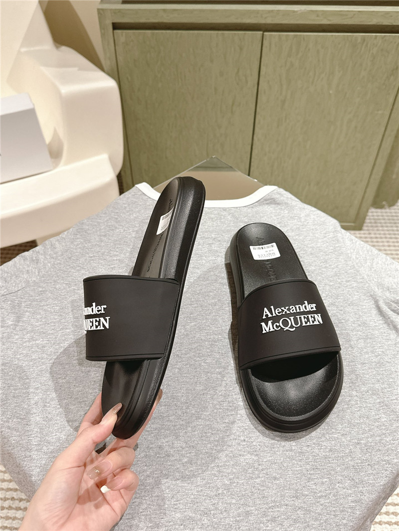 a1exa*der Mcqv*en black logo slide