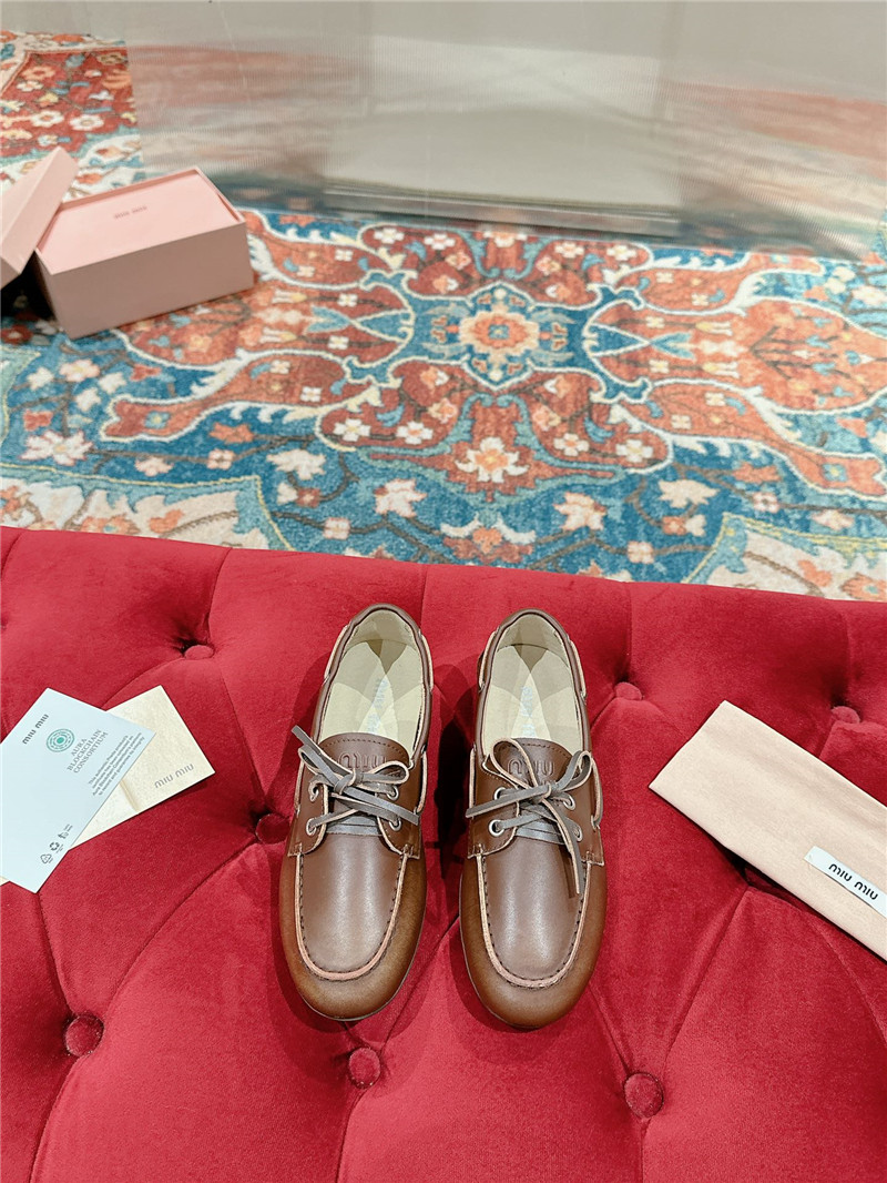 Miu Miu Bleached Leather Loafers