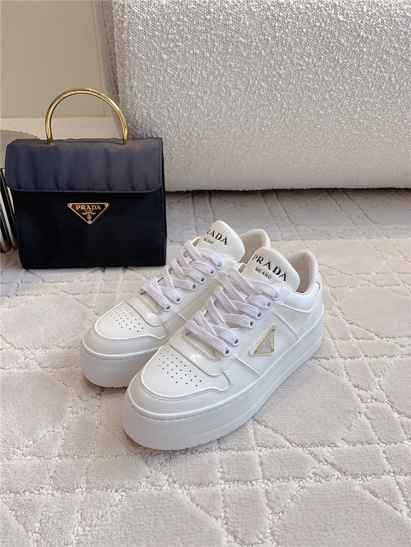 Pra*a triangle-logo white lace-up sneakers